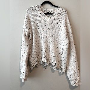 Distressed bubble knit sweater